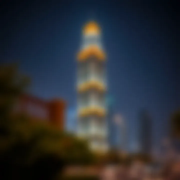 Daman Tower illuminated at night, symbolizing its significance in the urban environment