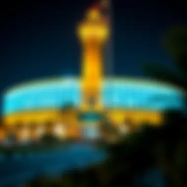 The Desert Sun Tower illuminated at night, highlighting its architectural beauty