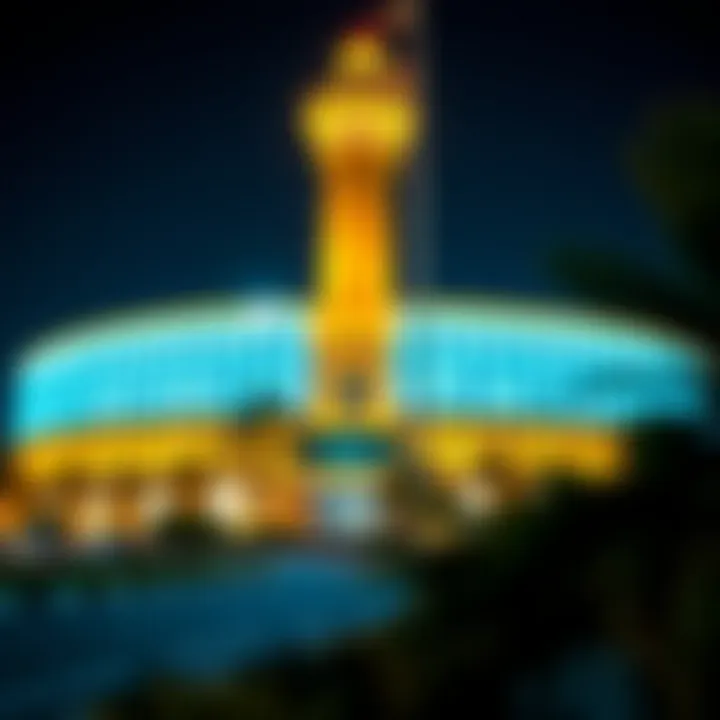 The Desert Sun Tower illuminated at night, highlighting its architectural beauty