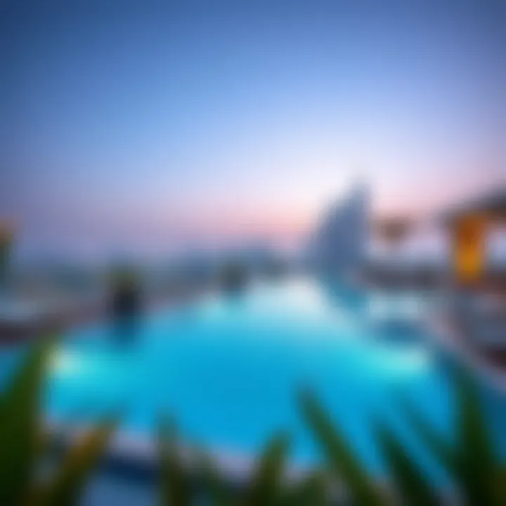 Rooftop Oasis: Pool with a View at DoubleTree by Hilton Dubai Al Barsha The inviting rooftop pool area with breathtaking city skyline views