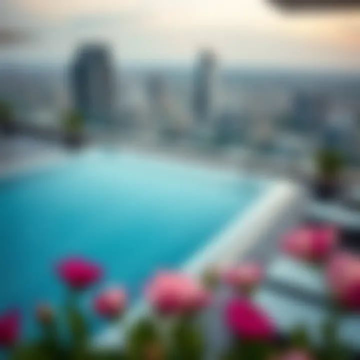 Hotel rooftop pool with city skyline