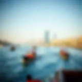 A scenic view of Dubai Creek showcasing traditional abras in motion.