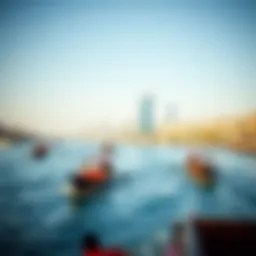 A scenic view of Dubai Creek showcasing traditional abras in motion.